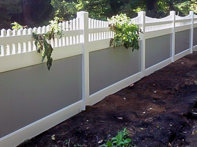 Beautiful white vinyl fence around front yard